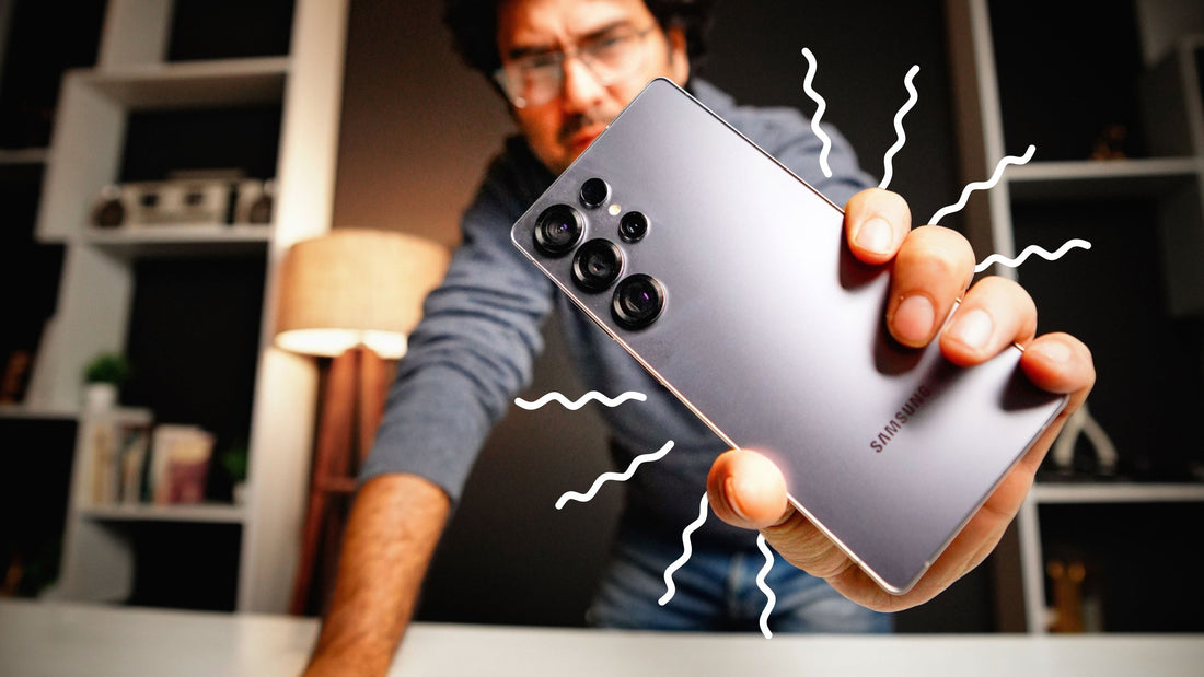 A man holding a comically vibrating Samsung Galaxy S25
