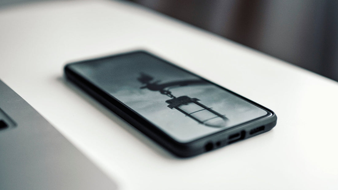 Smartphone with a blurred background on a light surface
