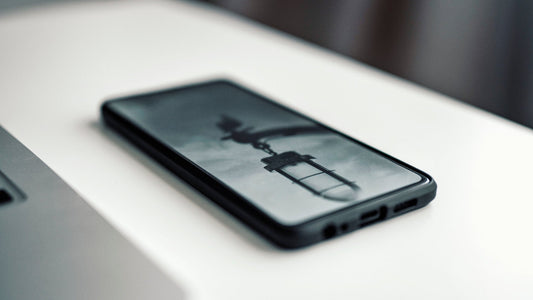Smartphone with a blurred background on a light surface