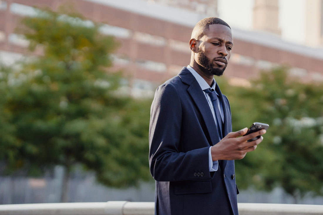 Businessman running his company from his smartphone