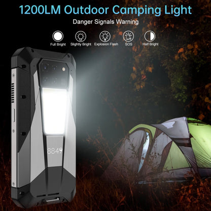 Outdoor camping light with multiple brightness made by Unihertz Tank 3 Pro, set near a tent in a forest setting