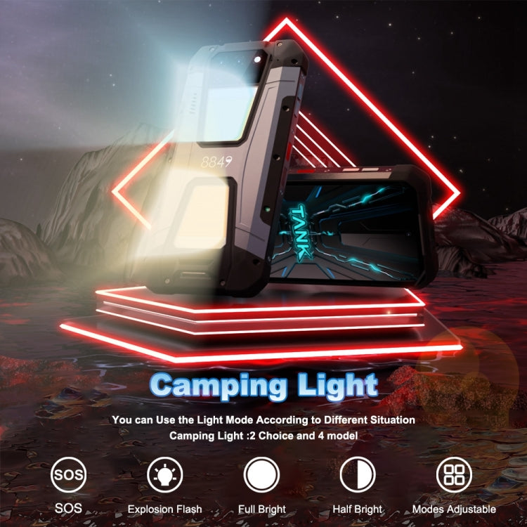 Camping light device with smartphone Unihertz Tank 2 on a dark outdoor background